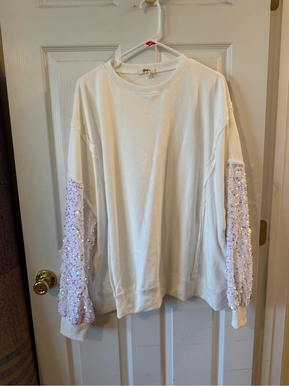 Creamy White Sweatshirt with Sequin Lavender Sleeves